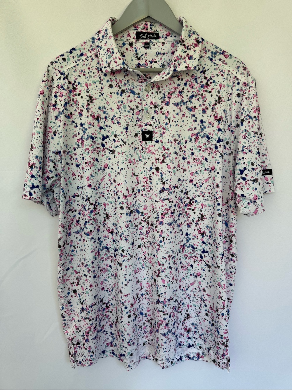 Bad Birdie - White Golf Polo with Pink and Blue Paint-Splash Print